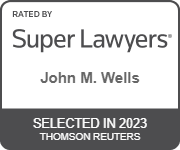 John M. Wells super lawyers badge