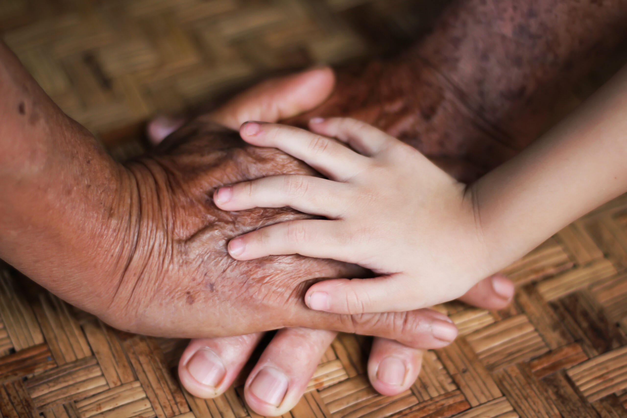 picture of parents and a child holding hands