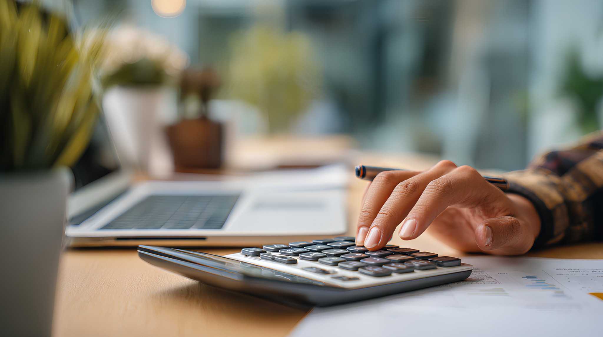 hand using a calculator